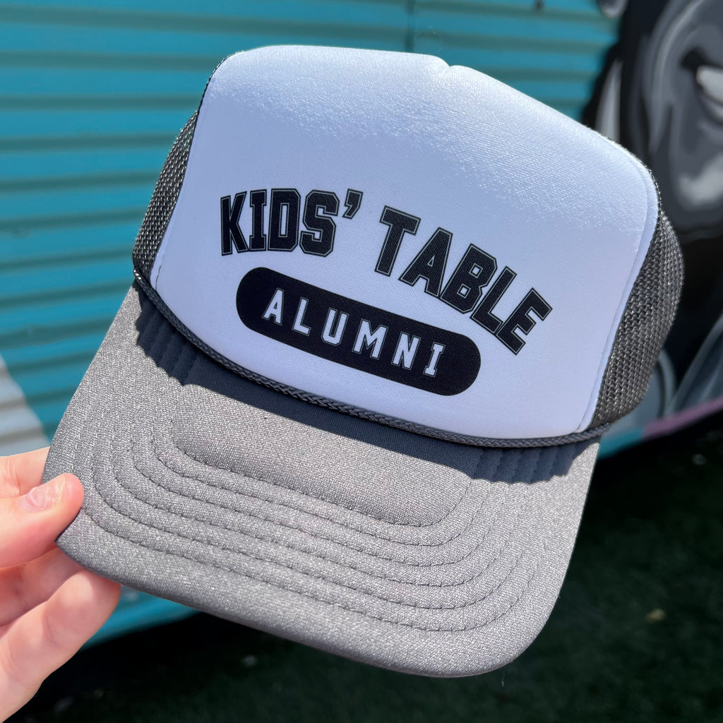 Kid’s Table Alumni Trucker Cap (Multiple Color Options)